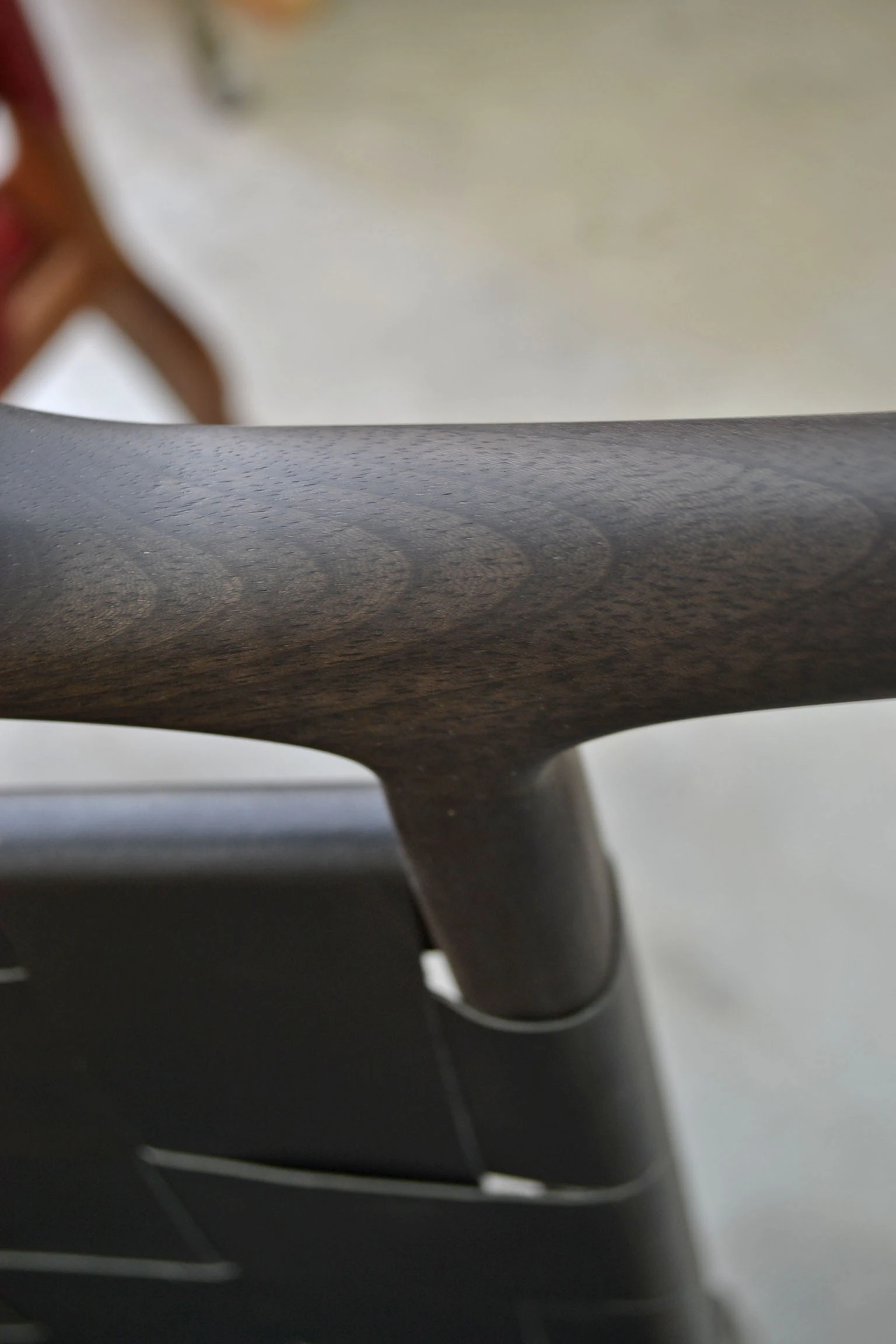 Ebonized Nadyr Chair, curve of the backrest rail