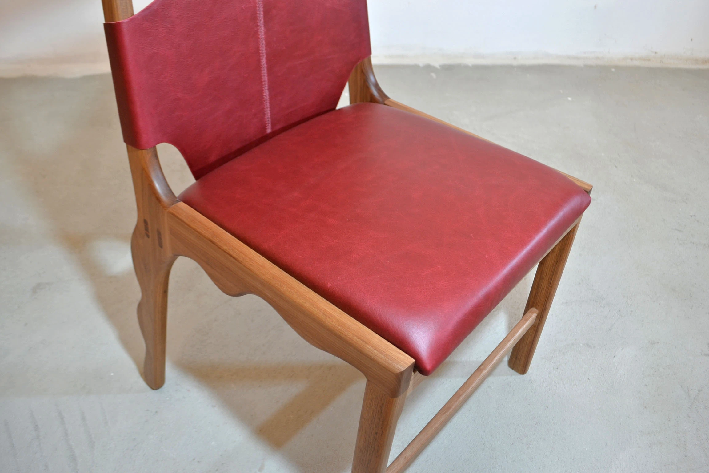 Red leather seat seen from above